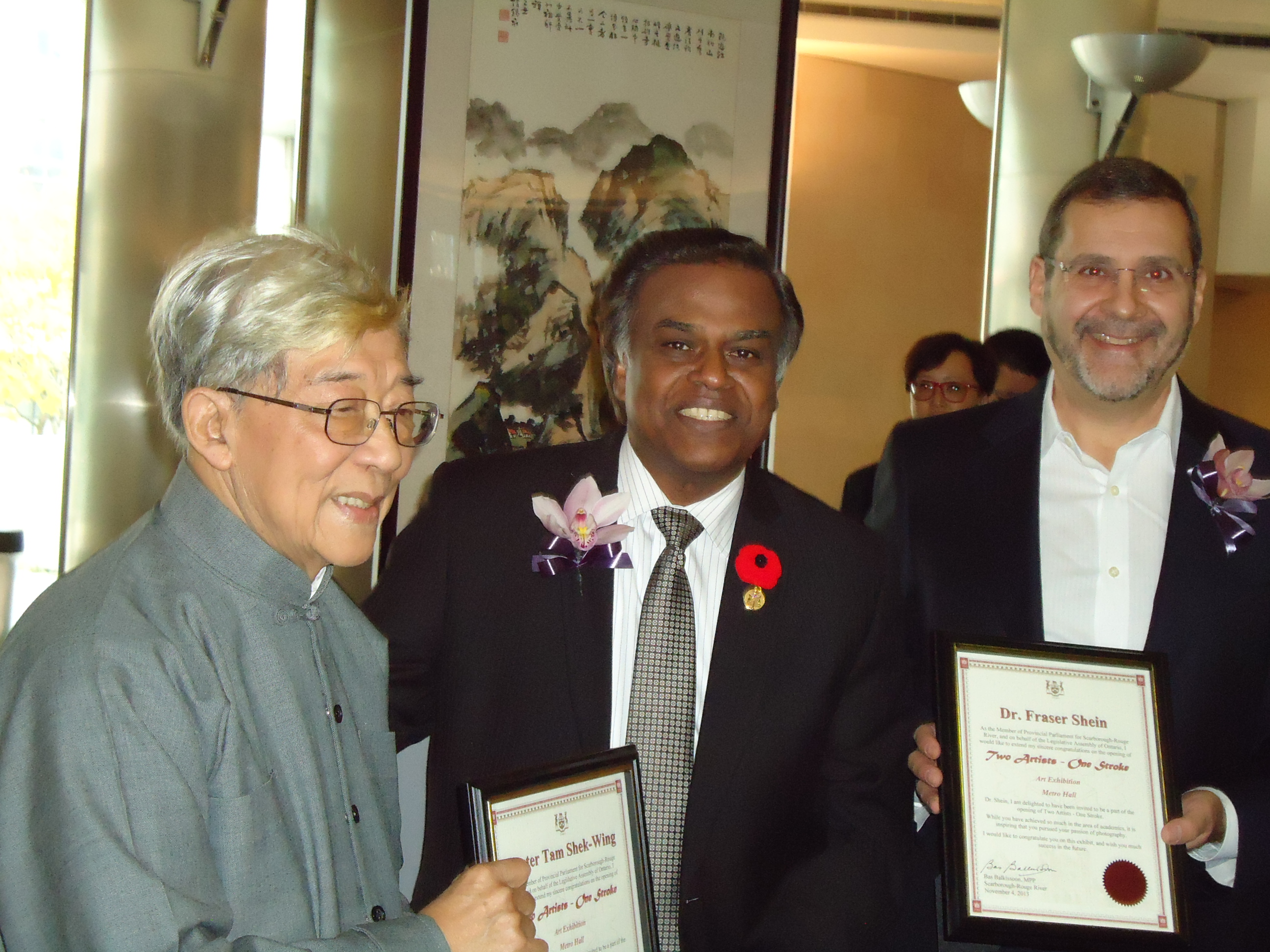 Tam and Shein, each received a certificate from Liberal MPP Bas Balkissoon.