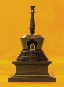 Ten such statuettes of Padmasambhava were made out of the blessed pills (dutsi rilbu) left behind by generations of Nyingma masters. One was granted to Master Tam by Dudjom Rinpoche. Shown here, the statuette is now kept in a golden shrine.
